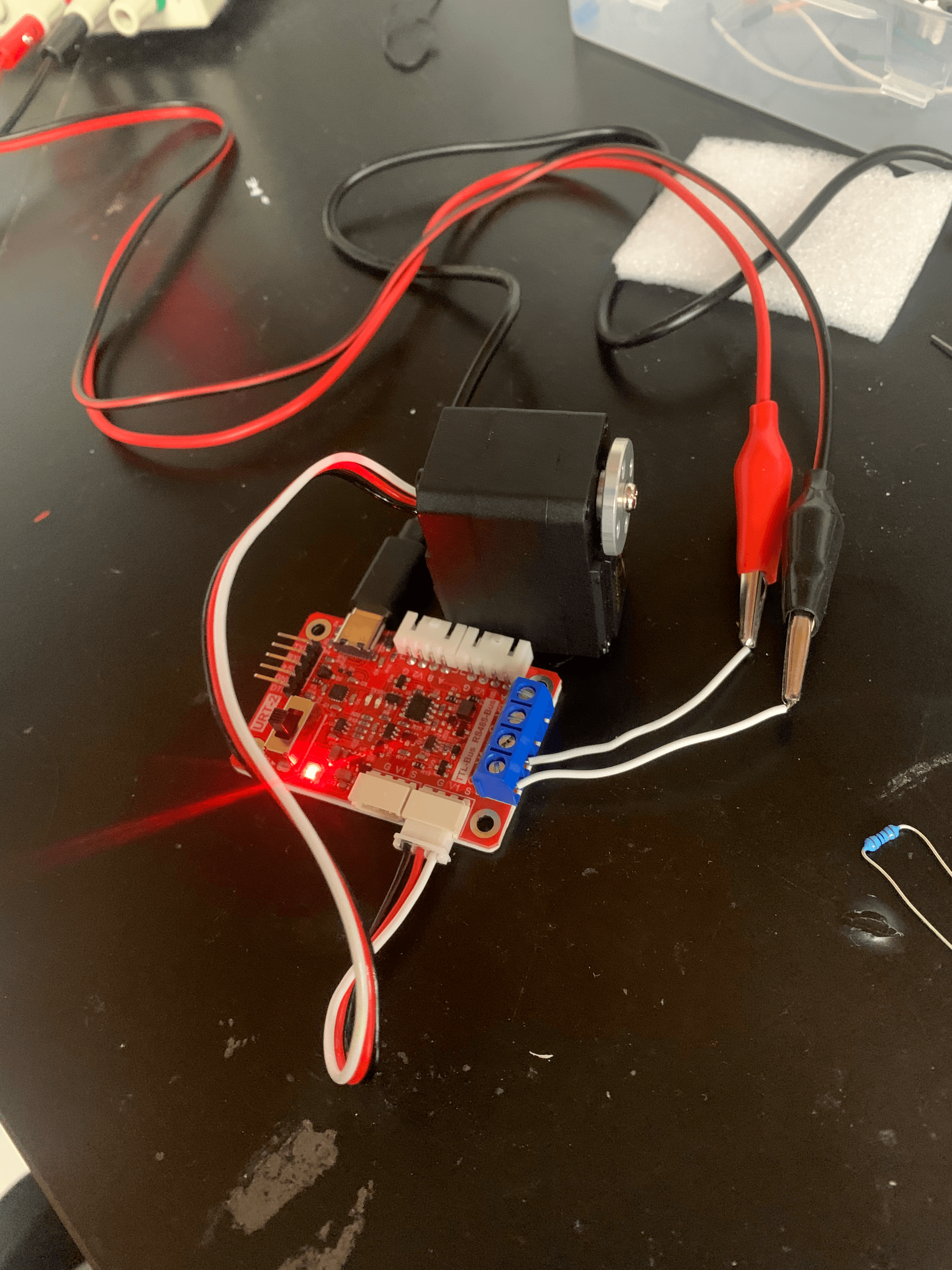 Bench testing. The URT-1 came with the servo, and I used it to assign the servo ID to 1 for simplicity.